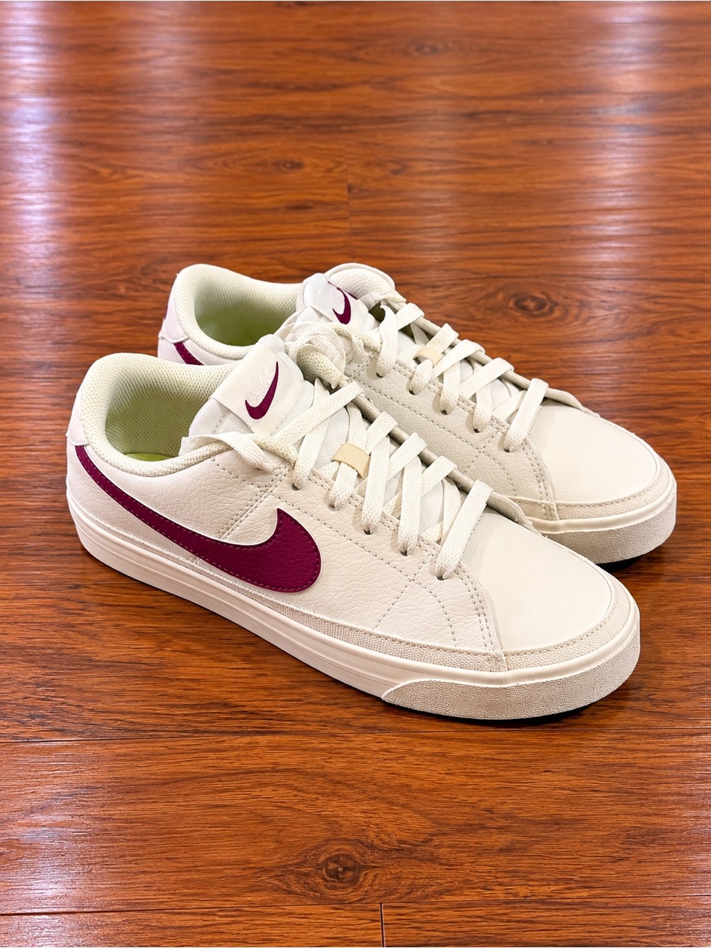 Nike Women’s Low-Top Sneakers in Cream with Burgundy Swoosh